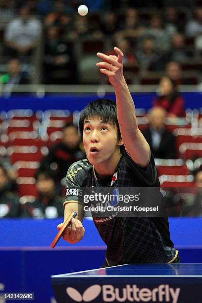 Kenji Matsudaira of Japan serves during his match against Yang Zi of Singapore during the LIEBHERR table tennis team world cup 2012 championship...