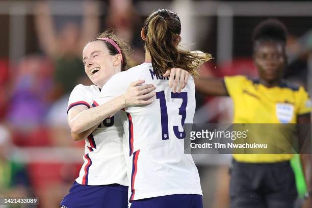 Rose Lavelle and Alex Morgan of the United States celebrate the team's second goal scored by Lavelle at Audi Field on September 06, 2022 in...