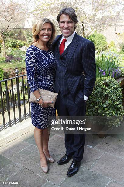 John and Melanie Bishop attend a tea reception to congratulate Sport Relief 2012 celebrity challengers at No. 10 Downing Street on March 30, 2012 in...