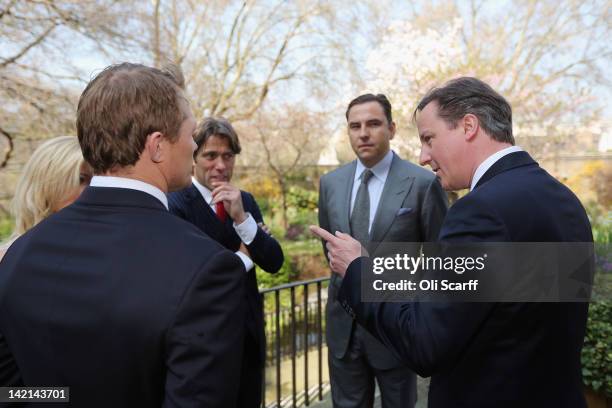 British Prime Minster David Cameron meets with former England Rugby Union player Josh Lewsey , TV presenter Helen Skelton and comedians John Bishop...