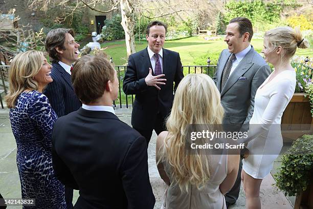 British Prime Minster David Cameron meets with former England Rugby Union player Josh Lewsey , TV presenter Helen Skelton , comedian John Bishop and...