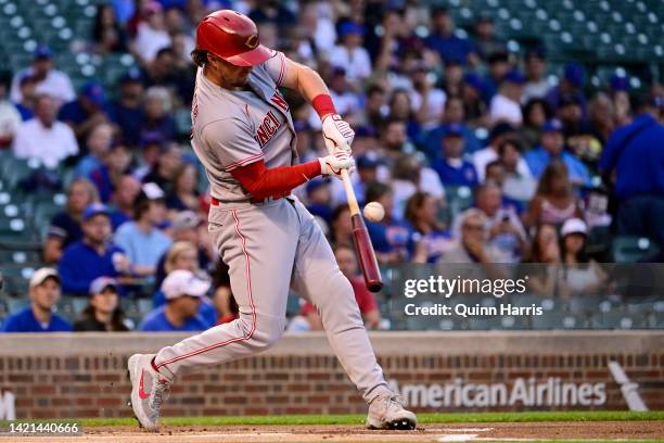 Kyle Farmer of the Cincinnati Reds hits a two run triple in the first inning against the Chicago Cubs at Wrigley Field on September 06, 2022 in...