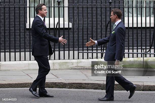 Finnish Prime Minister Jyrki Katainen is greeted by British Prime Minister David Cameron outside Number 10 Downing Street on March 30, 2012 in...