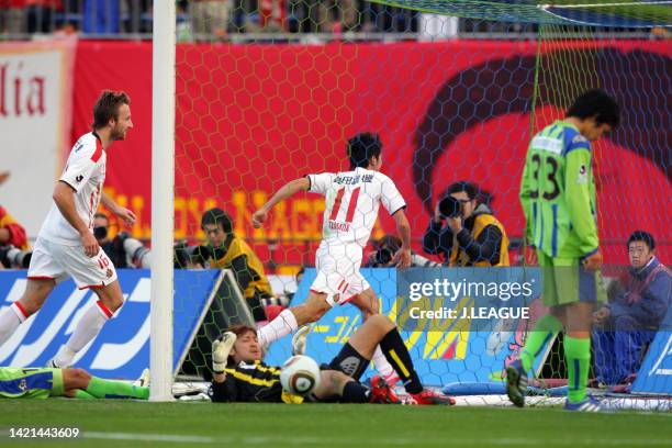 Keiji Tamada of Nagoya Grampus celebrates scoring his side's first goal during the J.League J1 match between Shonan Bellmare and Nagoya Grampus at...