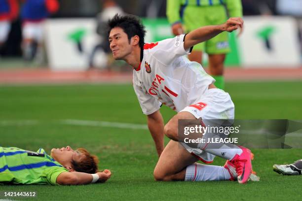 Keiji Tamada of Nagoya Grampus celebrates scoring his side's first goal during the J.League J1 match between Shonan Bellmare and Nagoya Grampus at...