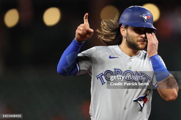 Bo Bichette of the Toronto Blue Jays celebrates his home run against the Baltimore Orioles during the third inning at Oriole Park at Camden Yards on...