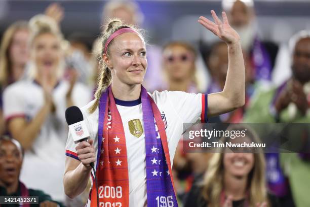 Becky Sauerbrunn of the United States looks on during a collective bargaining agreement signing signifying equal pay between the U.S. Men's and...