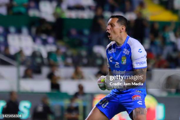 Rodolfo Cota, goalkeeper of Leon, celebrates his team's first goal during the 13th round match between Leon and FC Juarez as part of the Torneo...