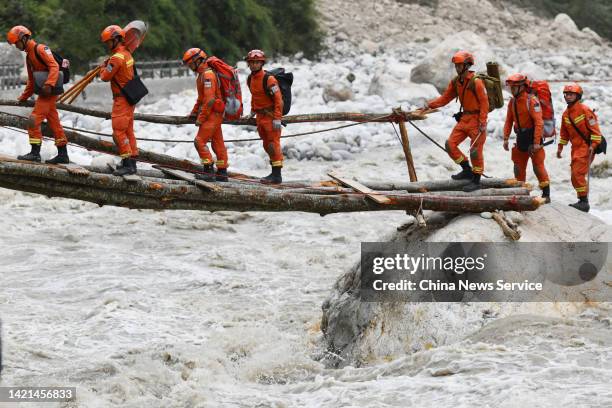 Rescuers head to a quake-hit area on September 6, 2022 in Luding County, Garze Tibetan Autonomous Prefecture, Sichuan Province of China. A...
