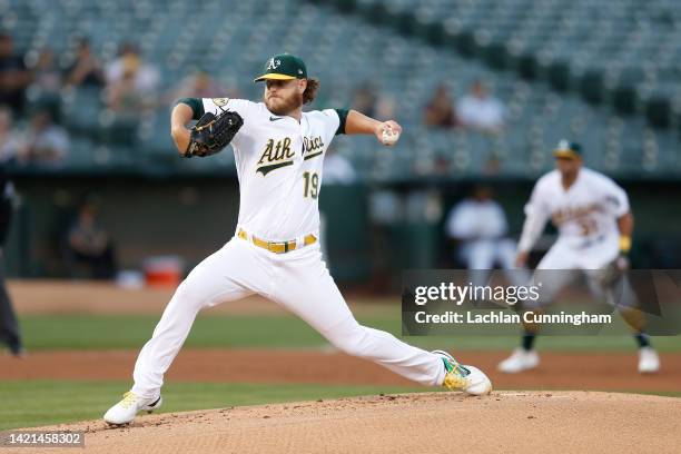 Cole Irvin of the Oakland Athletics pitches in the top of the first inning against the Atlanta Braves at RingCentral Coliseum on September 06, 2022...