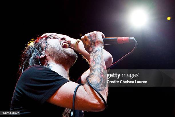 Vocalist Bert McCracken of The Used performs at the Vans Warped Tour 2012 kick off party and press conference at Club Nokia on March 29, 2012 in Los...