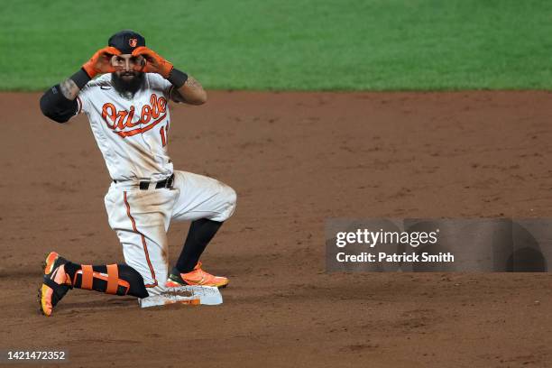 Rougned Odor of the Baltimore Orioles celebrates after sliding safely into second base for a double against the Toronto Blue Jays during the eighth...