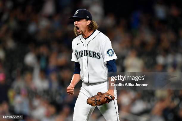 Logan Gilbert of the Seattle Mariners reacts to pitching his way out of a jam during the sixth inning against the Chicago White Sox at T-Mobile Park...