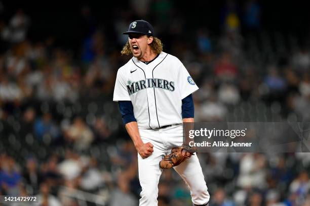 Logan Gilbert of the Seattle Mariners reacts to pitching his way out of a jam during the sixth inning against the Chicago White Sox at T-Mobile Park...