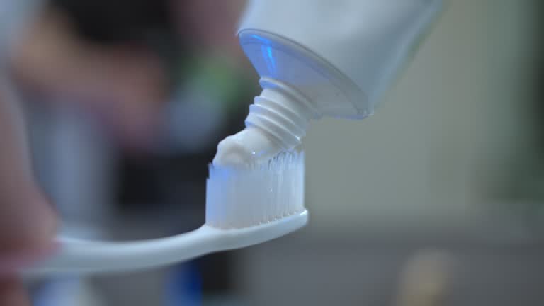 Human Toothpaste Inflation Human hands squeezing toothpaste on toothbrush,Close up 동영상 (1421482109 ...