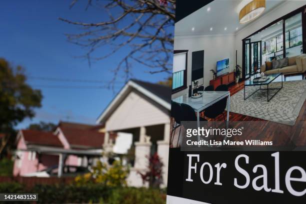 Real estate sign is seen at a property in Croydon Park on September 06, 2022 in Sydney, Australia. A rise in cost of living and increased mortgage...