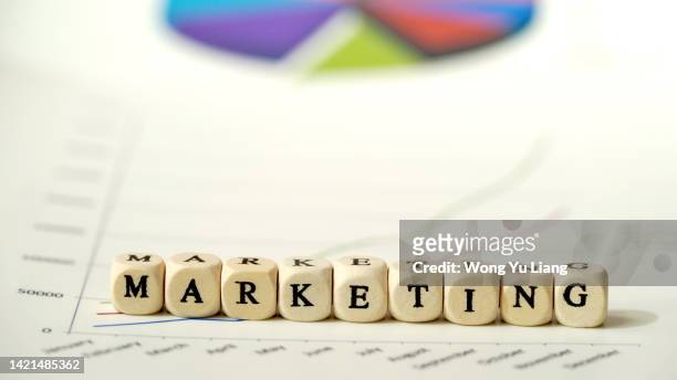 marketing word with copy space and graphs - eslogan fotografías e imágenes de stock