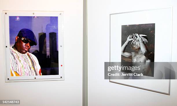Photographs of Biggie and Tupac take by Chi Modu are seen at the Chi Modu exhibition opening at Smile Gallery on March 29, 2012 in New York City.