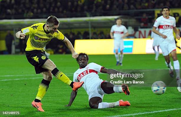 Jakub Blaszczykowski of Dortmund scores his teams second goal during the Bundesliga match between Borussia Dortmund and VfB Stuttgart at Signal Iduna...
