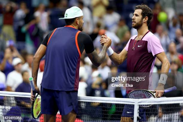 Karen Khachanov shakes hands with Nick Kyrgios of Australia after their Men’s Singles Quarterfinal match on Day Nine of the 2022 US Open at USTA...