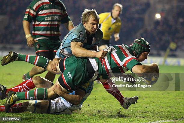 Thomas Waldrom of Leicester dives over to score a try during the Aviva Premiership match between Leicester Tigers and Worcester Warriors at Welford...