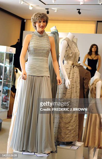 Life-sized wax mannequin of Princess Diana wearing a Catherine Walker dress stands on display ahead of an auction in Beverly Hills on March 30, 2012...