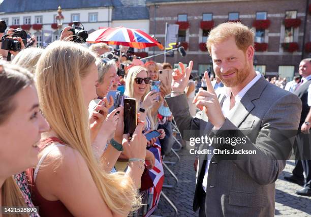 Prince Harry, Duke of Sussex meet members of the public as they leave the town hall during the Invictus Games Dusseldorf 2023 - One Year To Go...