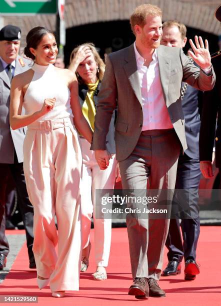 Prince Harry, Duke of Sussex and Meghan, Duchess of Sussex arrive at the town hall during the Invictus Games Dusseldorf 2023 - One Year To Go events,...