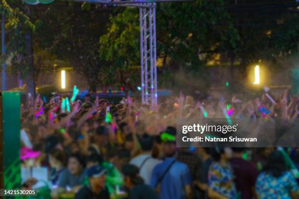image blur of raised hands on disco. concept of party background photo. - thailand illumination festival bildbanksfoton och bilder