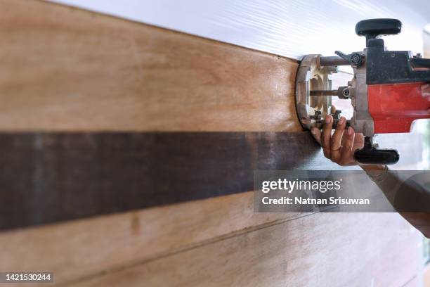carpenter working the wood, renovation home. - wood veneer stock pictures, royalty-free photos & images