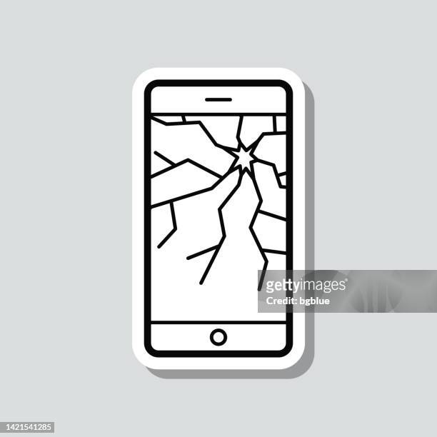 smartphone with broken screen. icon sticker on gray background - breaking stock illustrations