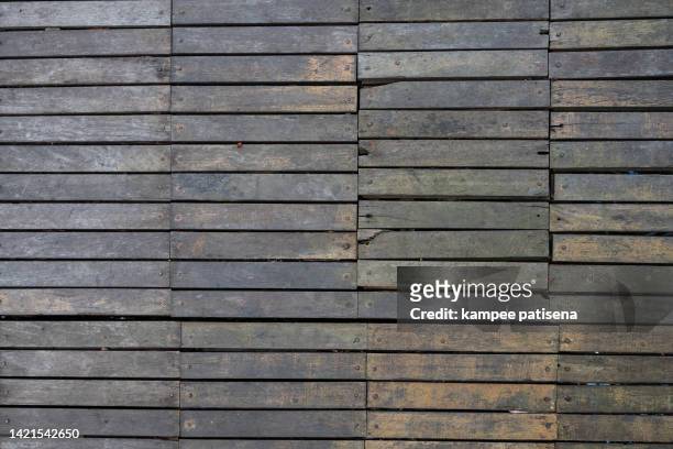 wood panel texture background - damaged fence stock pictures, royalty-free photos & images