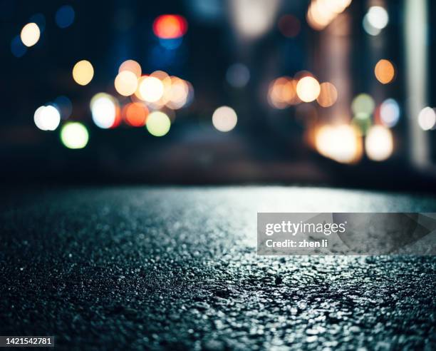 city street in rainy night - wet asphalt stock pictures, royalty-free photos & images