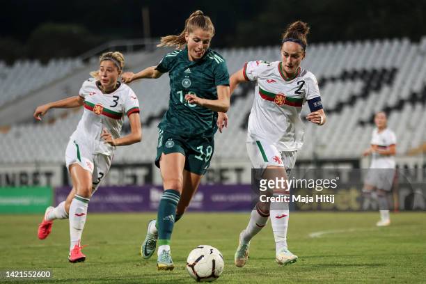 Tabea Wassmuth of Germany and Nikoleta Boycheva of Bulgaria battle for possession during the FIFA Women's World Cup 2023 Qualifier group H match...