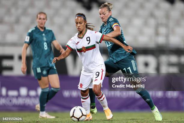 Alexandra Popp of Germany battle for possession with Lora Petrova of Bulgaria during the FIFA Women's World Cup 2023 Qualifier group H match between...