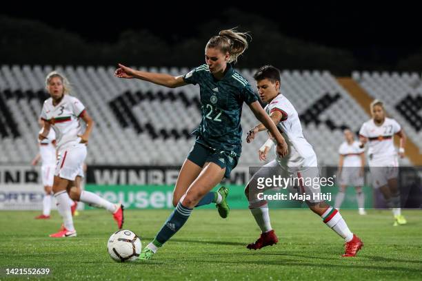 Jule Brand of Germany and Mariela Nedeva of Bulgaria battle for possession during the FIFA Women's World Cup 2023 Qualifier group H match between...