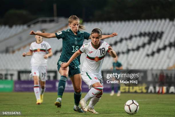 Tabea Wassmuth of Germany and Kristiana Karaivanova of Bulgaria battle for possession during the FIFA Women's World Cup 2023 Qualifier group H match...