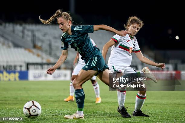 Sophia Kleinherne of Germany and Silvia Kefalova of Bulgaria battle for possession during to the FIFA Women's World Cup 2023 Qualifier group H match...