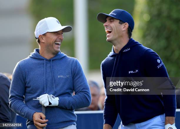 Billy Horschel of The United States enjoys a moment with Mark Noble of England the former West Ham United Premier League footballer during the pro-am...