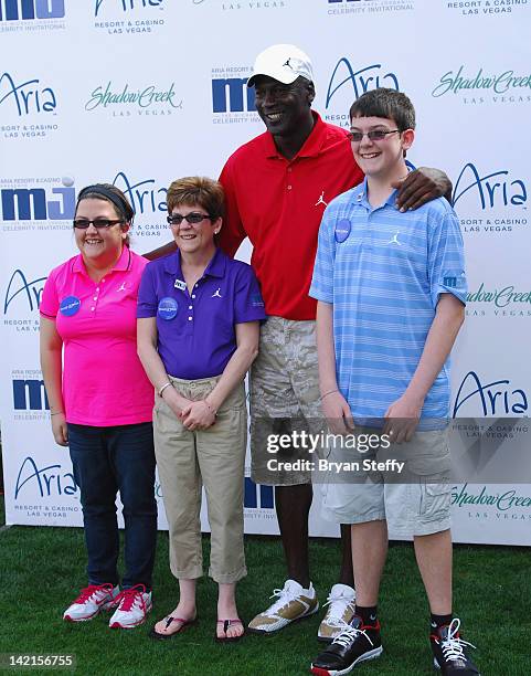 Sister Natalie Stroud, Mother Tammy Stroud and Make-A-Wish child Lucas Stroud attend the 11th Annual Michael Jordan Celebrity Invitational hosted by...