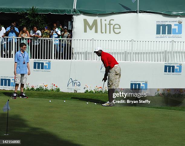 Michael Jordan fulfills a wish for Make-A-Wish child Lucas Stroud at the 11th Annual Michael Jordan Celebrity Invitational hosted by Aria Resort &...