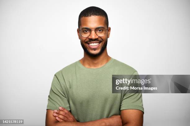 african american bearded businessman against white background - waist up photos et images de collection