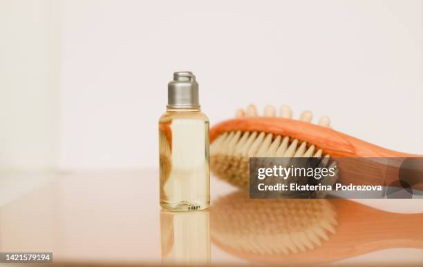 bath brush, spa care, dry massage, washing, relaxation, shower oil - scheuerbürste stock-fotos und bilder