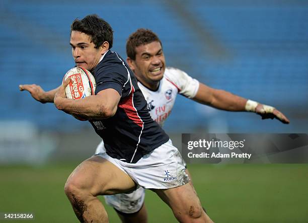 Rowan Varty of Hong Kong in action during the match between Hong Kong and the United States during day one of the Tokyo Sevens at Prince Chichibu...