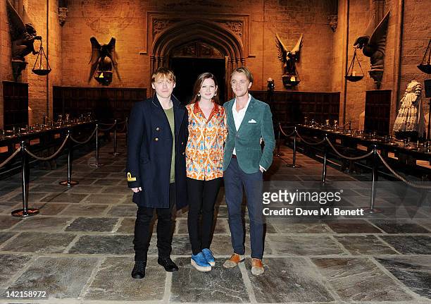 Actors Rupert Grint, Bonnie Wright and Tom Felton attend the Grand Opening of the Warner Bros. Studio Tour London: The Making of Harry Potter on...