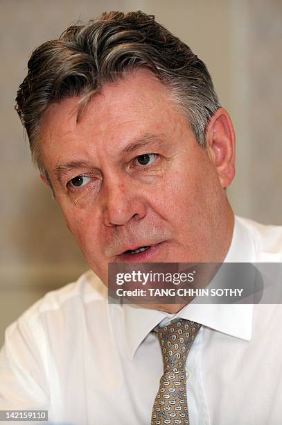 European Union Trade Commissioner Karel De Gucht speaks during an interview at a hotel in Phnom Penh on March 31, 2012. The European Union looks set...