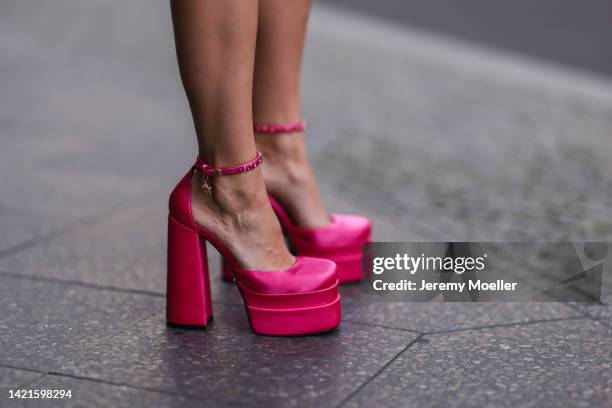 Palina Kozyrava is seen wearing pink plateau Versace heels, during Berlin Fashion Week Spring/Summer 2023, on September 06, 2022 in Berlin.