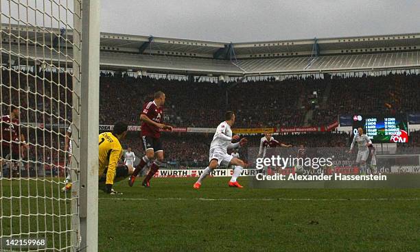 Arjen Robben of Muenchen scores the first goal during the Bundesliga match between 1.FC Nuernberg and FC Bayern Muenchen at Easy Credit Stadium on...