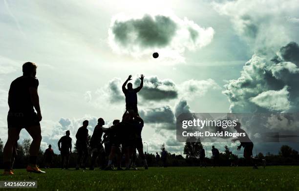 Silhouette of Northampton Saints as they practice during the training session held at Franklin's Gardens on September 07, 2022 in Northampton,...