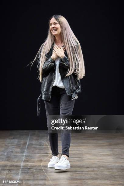 Designer Rebekka Ruétz acknowledges the applaud of the audience after the Rebekka Ruétz show during the Mercedes-Benz Fashion Week Berlin Spring...